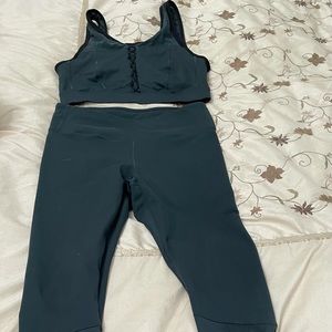 Fabletics Green Workout set with top and bottoms.
